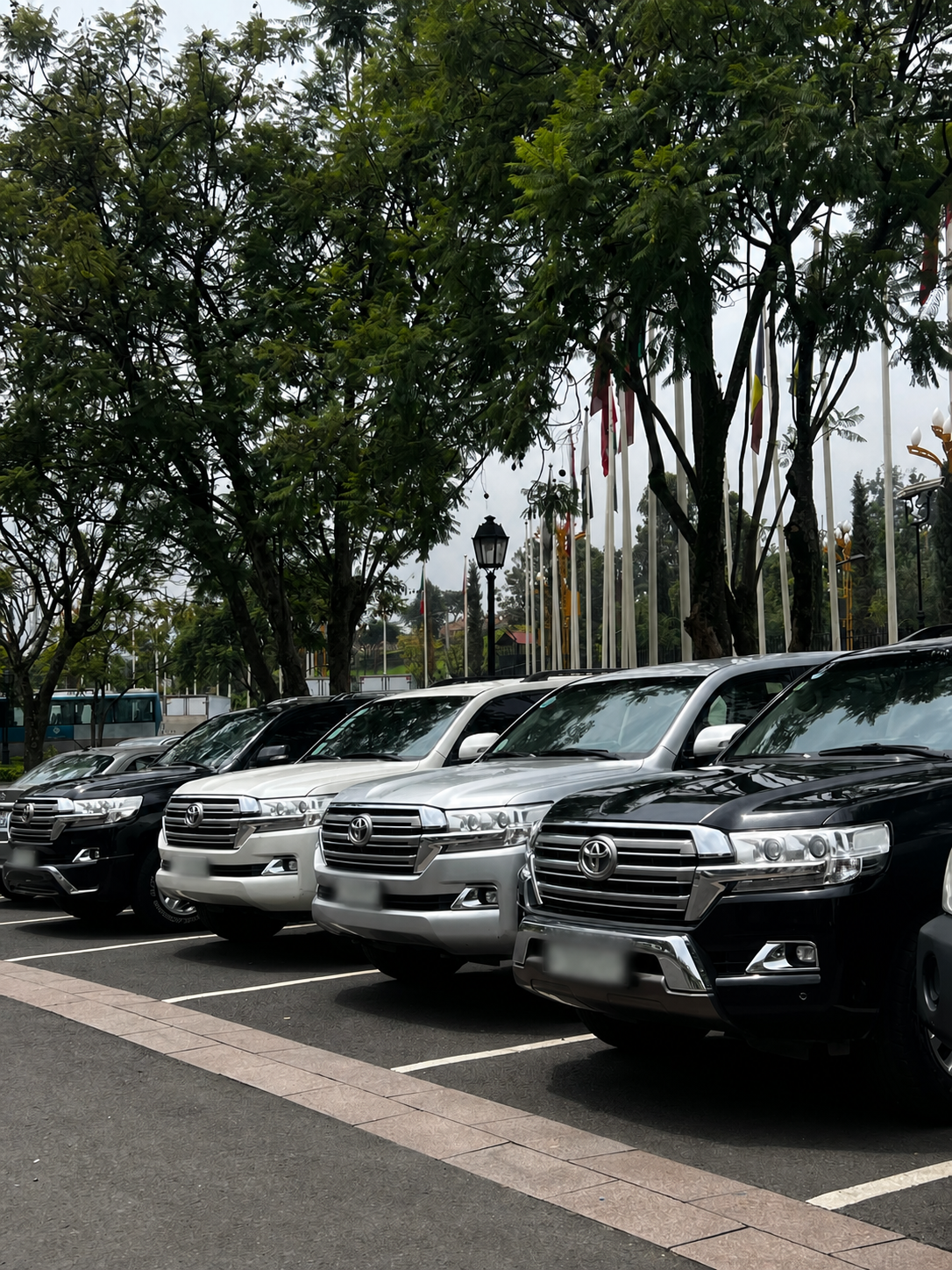 BlueFlag operational vehicle fleet in Addis Ababa with registration plates obscured for privacy